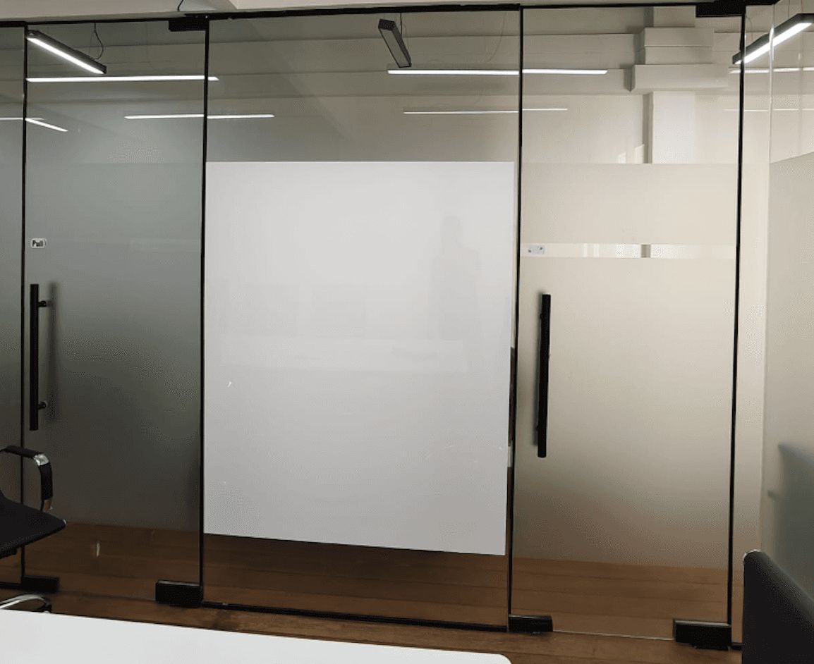 Writable glass partition with Wryte whiteboard film