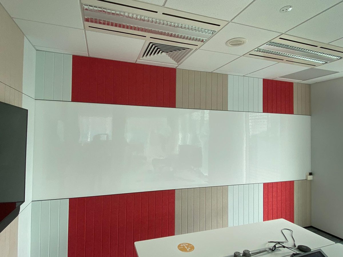 Whiteboard walls between feature panels, office
