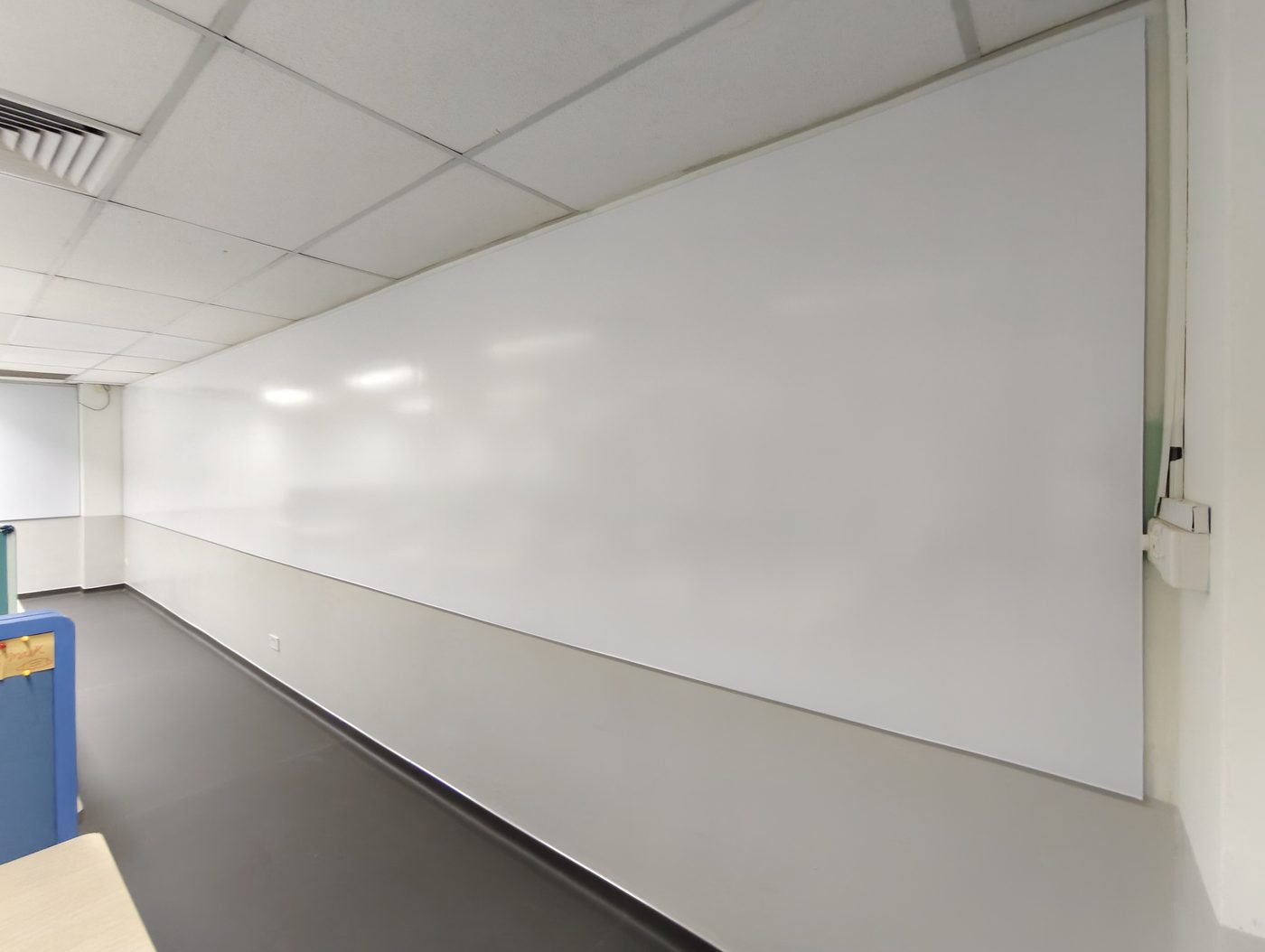 Long large-format magnetic whiteboard film wall installed by TWJ