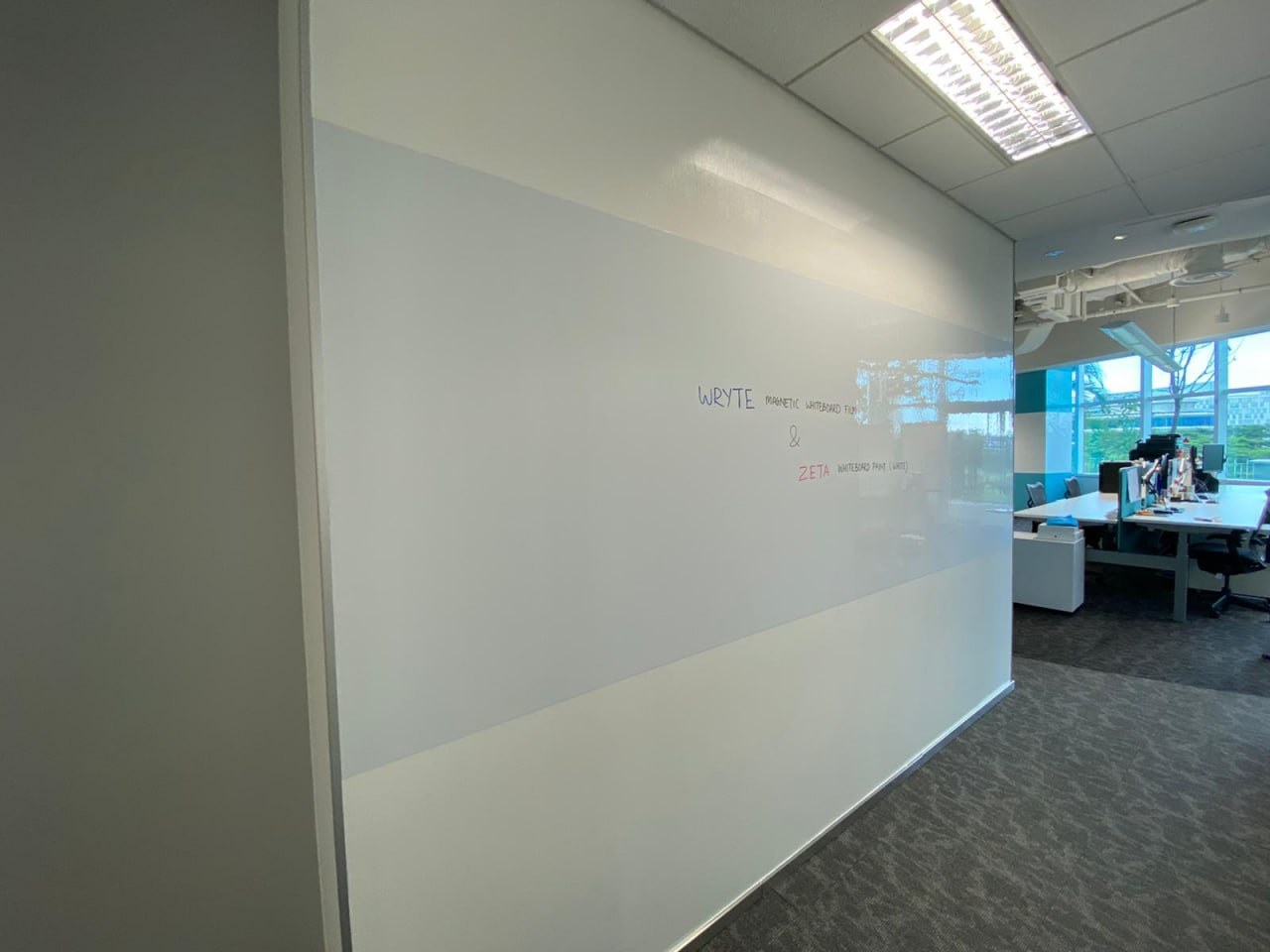 Full writable wall: Wryte magnetic whiteboard film in the middle with ZETA Whiteboard Paint above and below, Autodesk