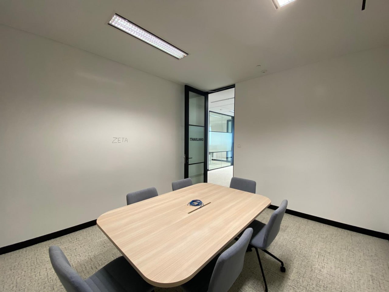 Meeting room with two full walls of ZETA Whiteboard Paint, Guoco Tower