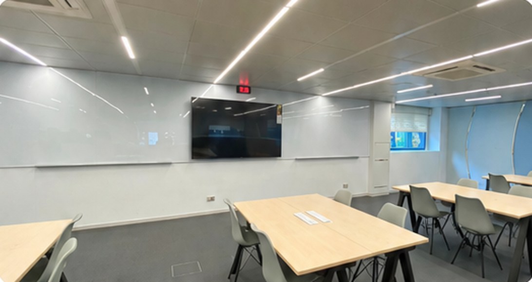 Full-width classroom whiteboard wall